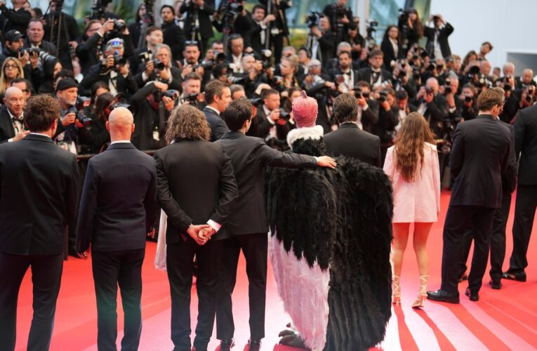 Bird man on red carpet leaves Cannes squawking