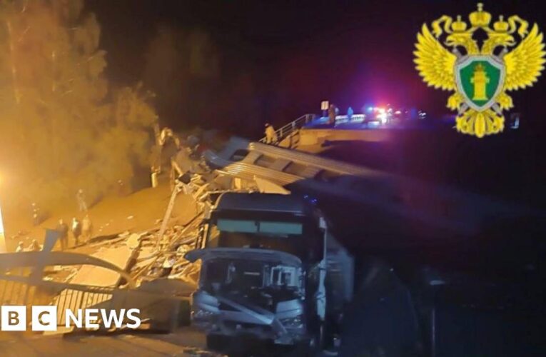 At least three dead after Russian bridge collapses onto train