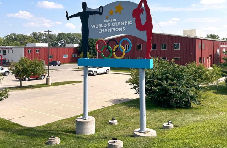 Ex-coach at U.S. gymnastics academy arrested by FBI after abuse reports